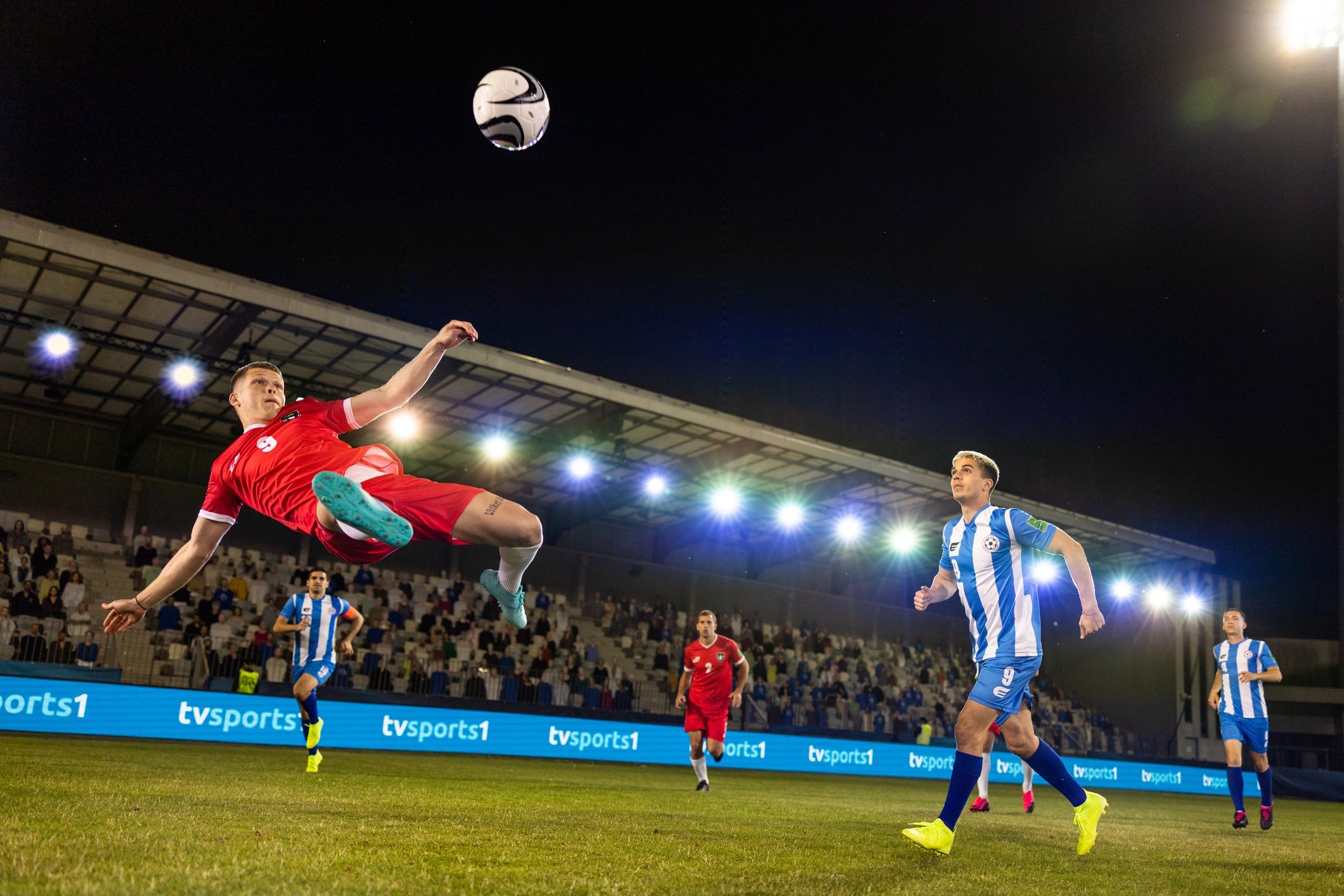Soccer player kicking the ball during a match