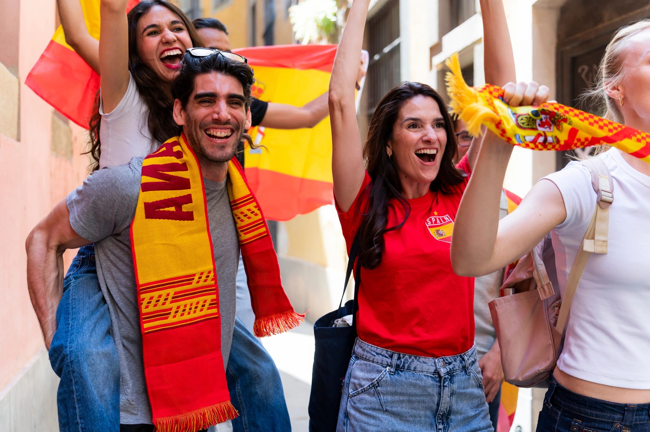 Football fans cheering and celebrating victory